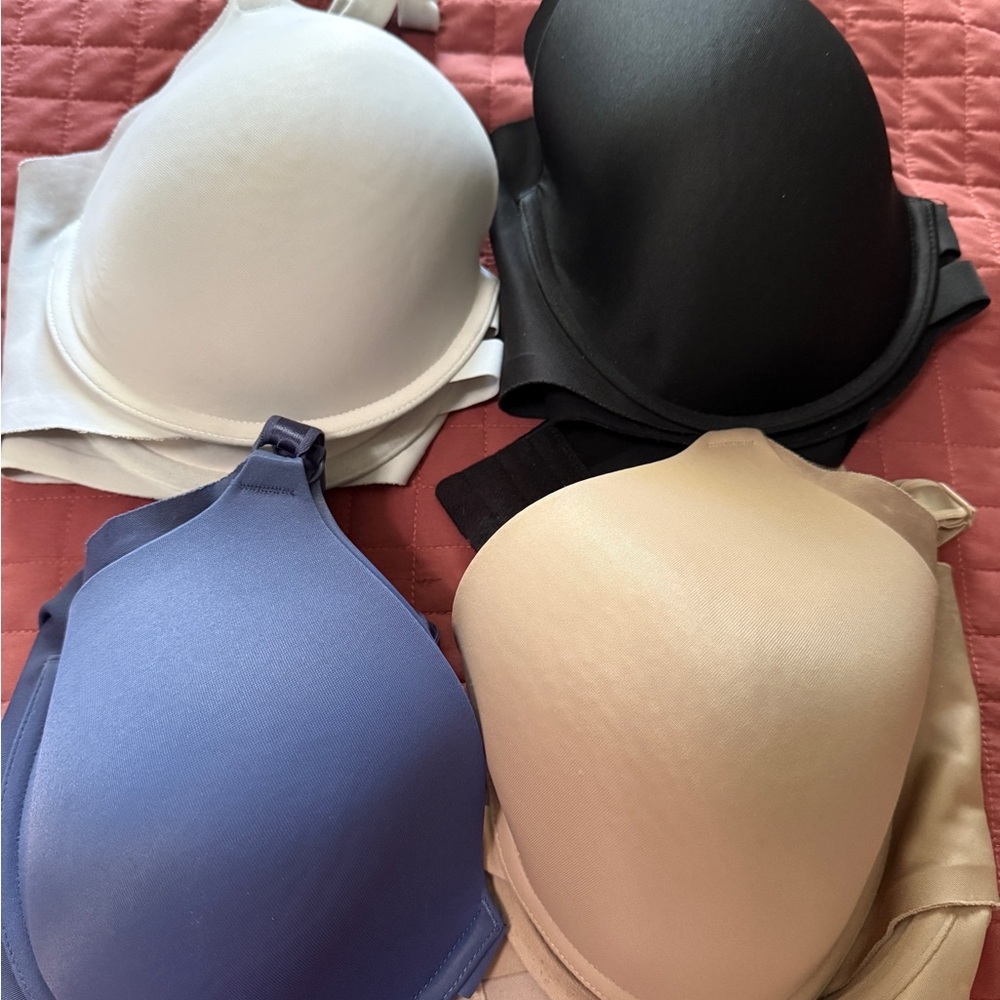 Set of Four Bras in Black, White, Blue, and Tan, size 40C
